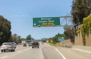 Northbound on 680 freeway exit on the Bollinger Canyon Road exit and make a right turn on to Bollinger Canyon and go to the second traffic light and turn left on Camino Ramon  (if you turn left it is Camino Ramon but if you turn right to the right the sign says Bishop Ranch #1).